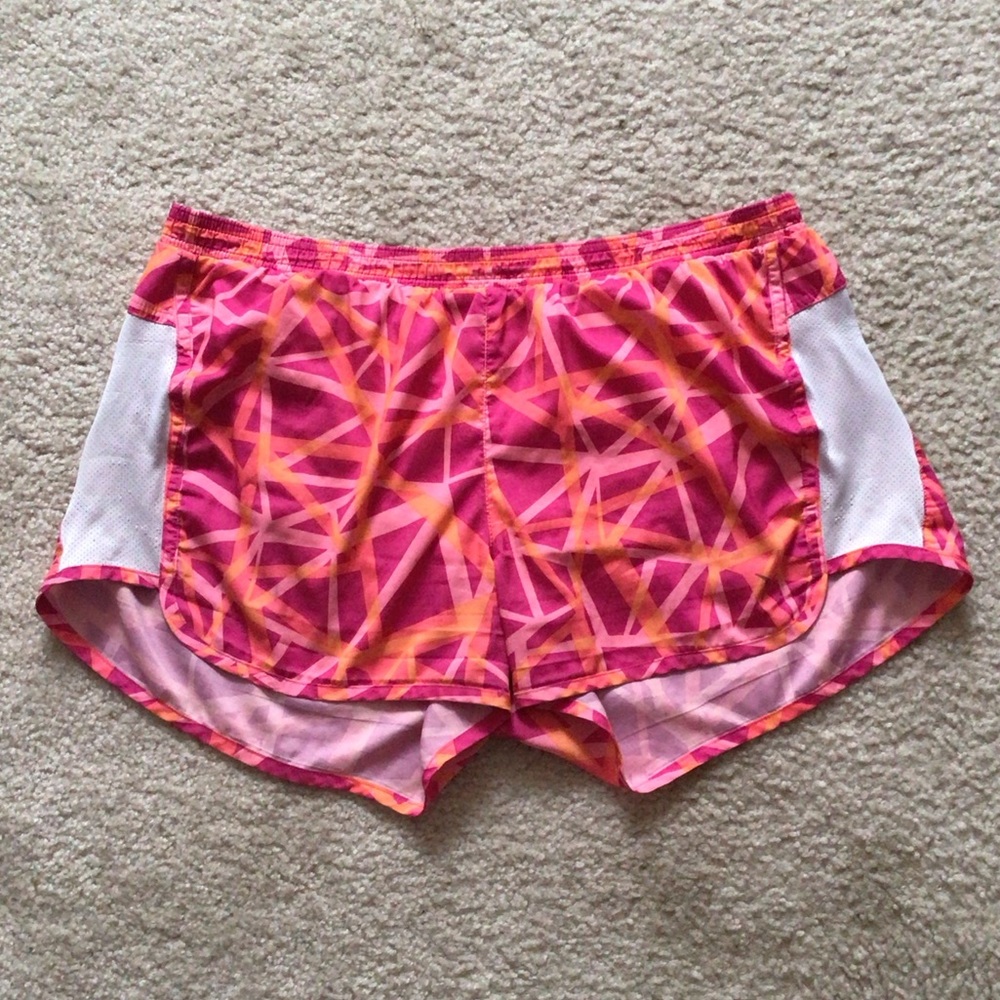 Athletic shorts from Old Navy active wear. Size large. Mostly pink.